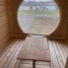 Quadrosauna kreisförmiges Panoramafenster im Ruheraum nah